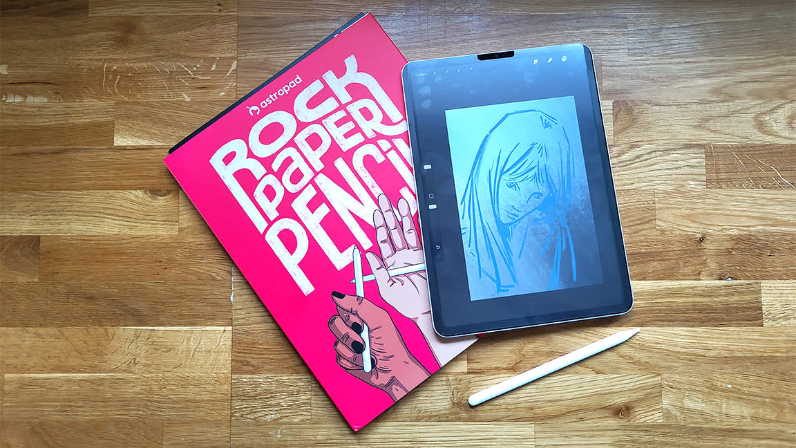  Rock Paper Pencil review; an iPad and iPad protective cover on a wooden table 