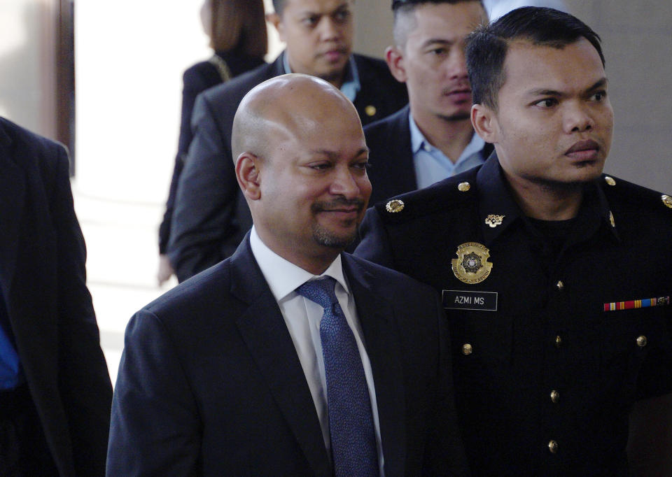 Former 1Malaysia Development Berhad CEO, Arul Kanda Kandasamy arrives at Kuala Lumpur High Court in Kuala Lumpur, Malaysia, Wednesday, Dec. 12, 2018. Arul and former Malaysia's Prime Minister, Najib Razak, face fresh charges for tempering 1MDB audit report. (AP Photo/Yam G-Jun)