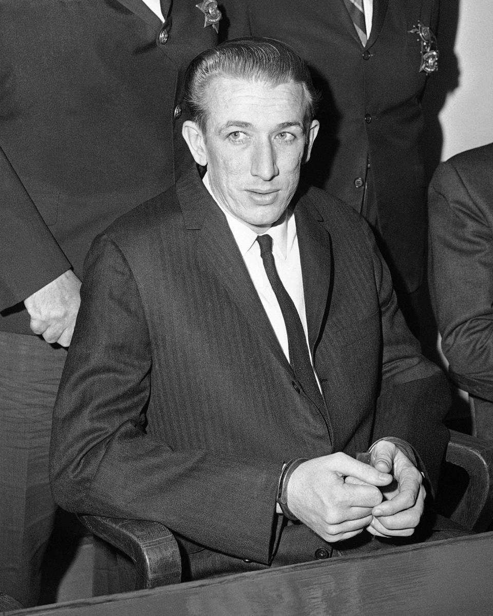 Richard Speck is seated before the press for a photo opportunity in October 1966, following accusations he killed several student nurses in July 1966 in Chicago. Speck was sent to prison, and died in 1991.