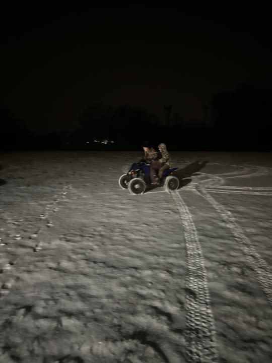 Addison and Jackson Prince are enjoying a nighttime ride through the snow in Columbia (Courtesy: Amanda Prince)