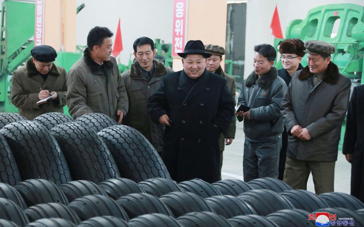 North Korea's leader Kim Jong Un inspects a tyre factory in Pyongyang December 3, 2017 - KCNA