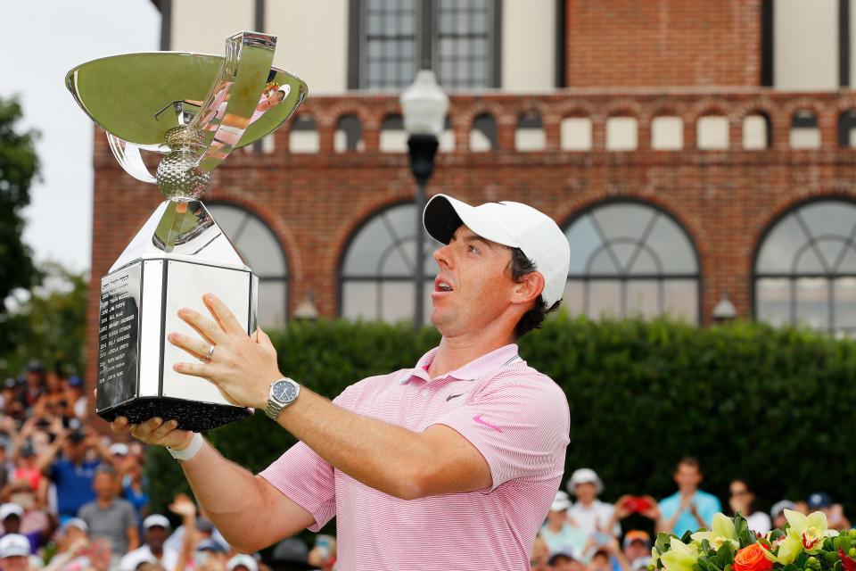 ATLANTA, GEORGIA - AUGUST 25: Rory McIlroy of Northern Ireland celebrates with the FedExCup trophy after winning during the final round of the TOUR Championship at East Lake Golf Club on August 25, 2019 in Atlanta, Georgia. (Photo by Kevin C. Cox/Getty Images)