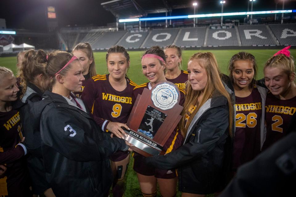 Windsor High School receives the state runner-up trophy after losing to Northfield High School in the 4A girls state soccer championship game at Dick's Sporting Goods Park in Commerce City, Colo., on Tuesday, May 24, 2022.