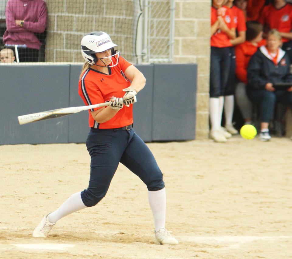 Pontiac's Makayla Metz swings at a pitch during the Indians' game with Central Catholic Monday. Metz singled on this play.