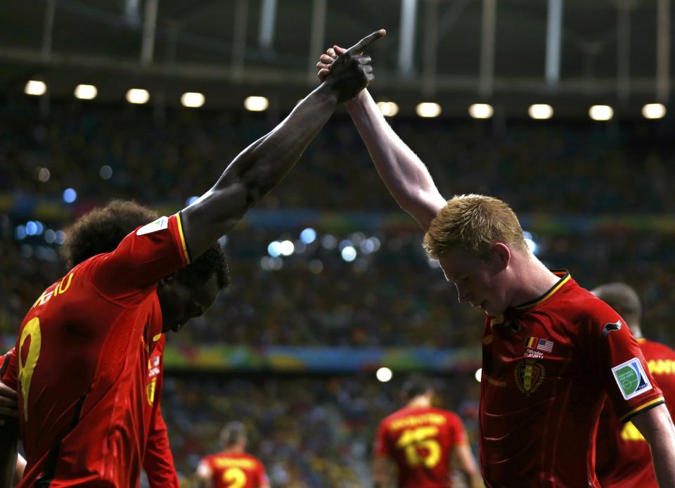 Belgium's Romelu Lukaku celebrates with Kevin De Bruyne (R) after scoring a goal during extra time in the 2014 World Cup round of 16 game between Belgium and the U.S. at the Fonte Nova arena in Salvador July 1, 2014. REUTERS/Marcos Brindicci