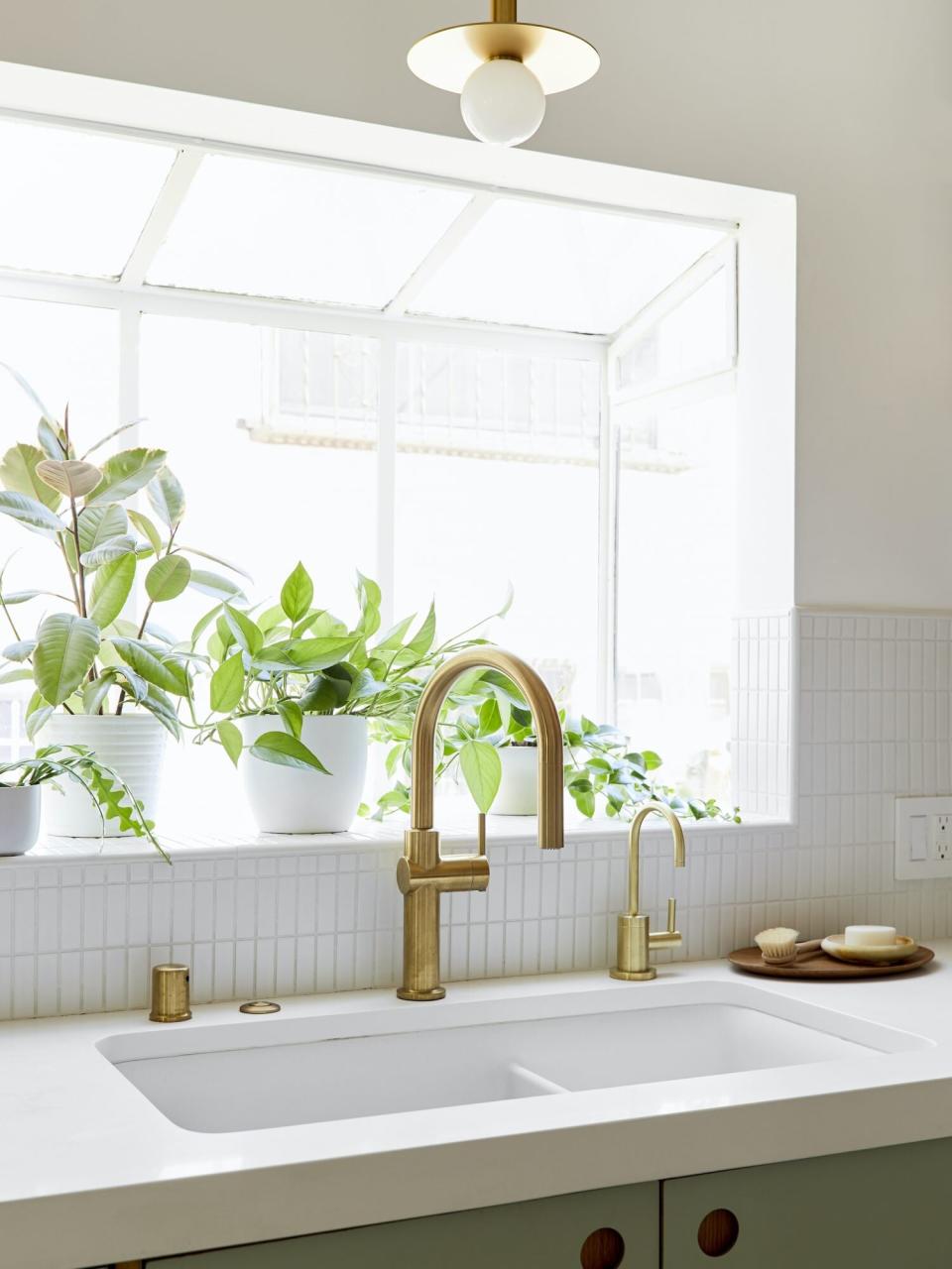 Kohler Brass Faucet in sunny kitchen