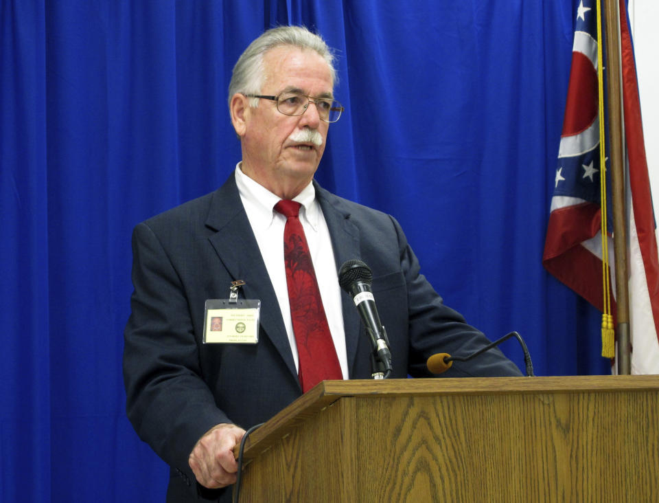 FILE – In this Nov. 15, 2017 file photo, federal public defender David Stebbins, an attorney for condemned Ohio inmate Alva Campbell, discusses the events that led to Campbell's execution being called off after unsuccessful attempts to find usable veins, in Lucasville, Ohio. Stebbins is one of a number of federal public defenders trying to represent 35-year-old Ohio death row inmate David Martin in hopes of saving his federal court appeals before his upcoming 2021 execution. (AP Photo/Andrew Welsh-Huggins, File)
