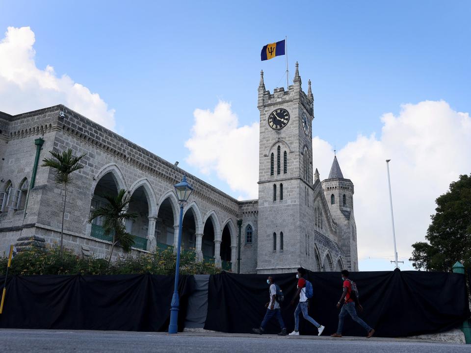 The Barbados flag flies above its parliament buildings