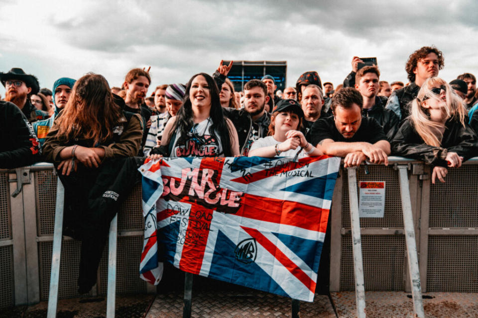 Mud be damned! These fans are still having a blast (Picture: Stuart Garneys for Rolling Stone UK)