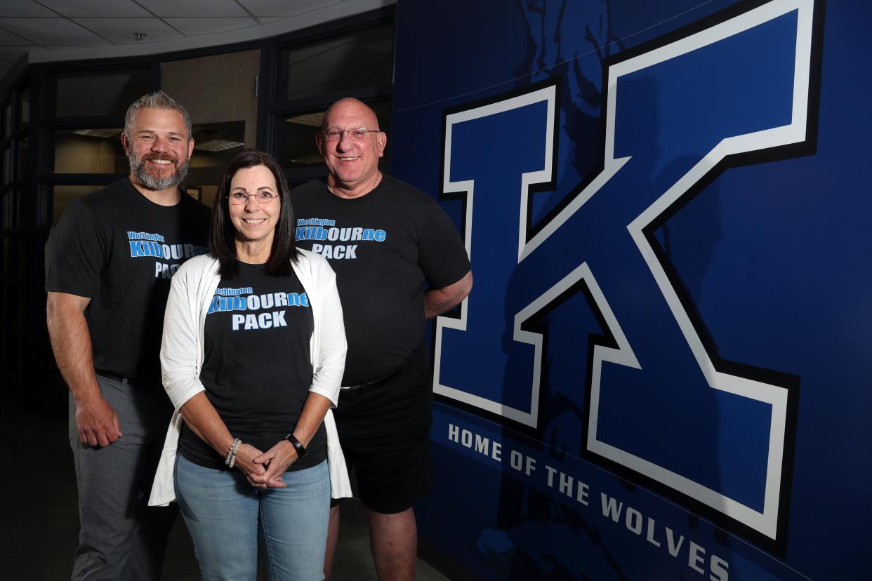 Worthington Kilbourne High School principal Aric Thomas (left) is shown with retiring Kilbourne teachers Ellen Clark and Vince Trombetti on May 4. Clark and Trombetti have spent 28 and 31 years, respectively, with the high school and are among several other Kilbourne teachers retiring at the end of this school year.