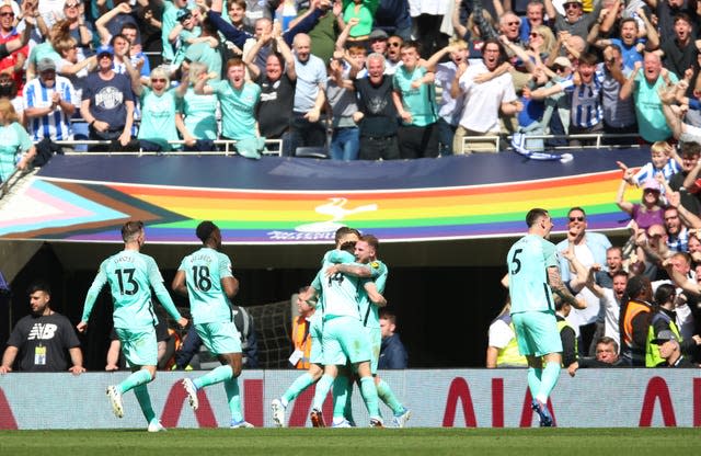 Brighton celebrate after Leandro Trossard scored their dramatic late winner 