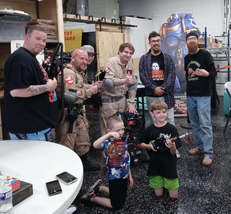 Gamers at Spooky's Game Night Round 2 take time out from gaming for a photo with the Black Swamp Ghostbusters. The next event takes place from 4 to 9 p.m. on Saturday, Jan. 6 at Our House Games, 1211 S. Monroe St.