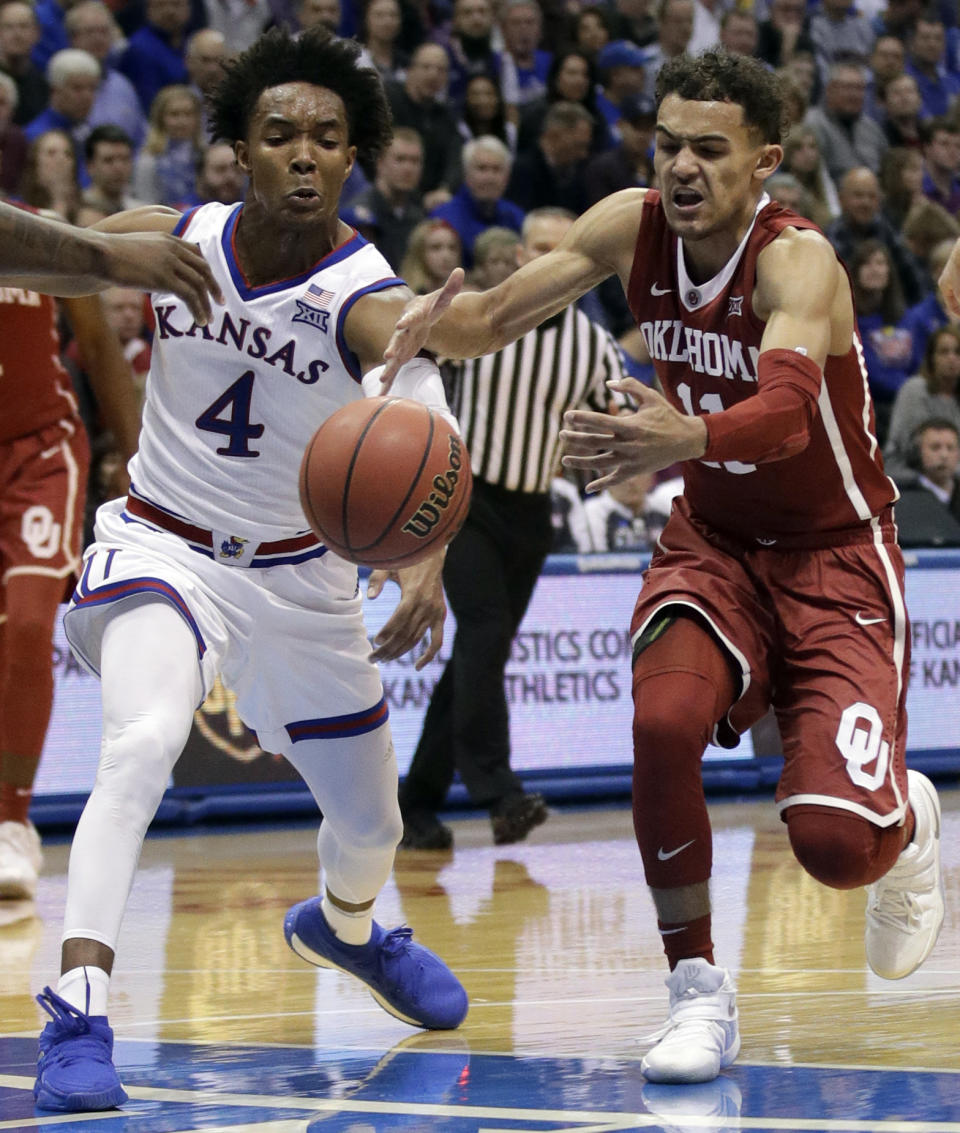 Kansas guard Devonte’ Graham scored 23 points as Kansas blew out Oklahoma. (AP Photo/Orlin Wagner)