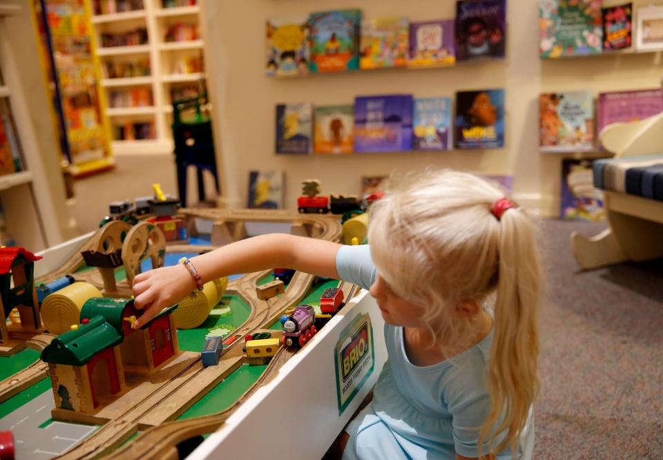 Margo Petsalis, 5k, plays in the children's at the Full Circle Bookstore is pictured in Oklahoma City, Tuesday, June 7, 2022.