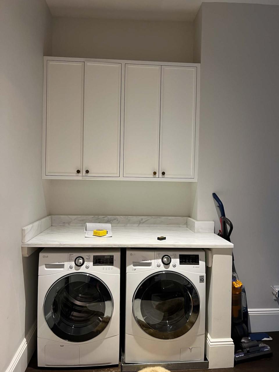 BEFORE: Before Louise stepped in, the laundry room was just that—a laundry room. It was certainly not the kind of space where the couple could imagine sleeping guests.