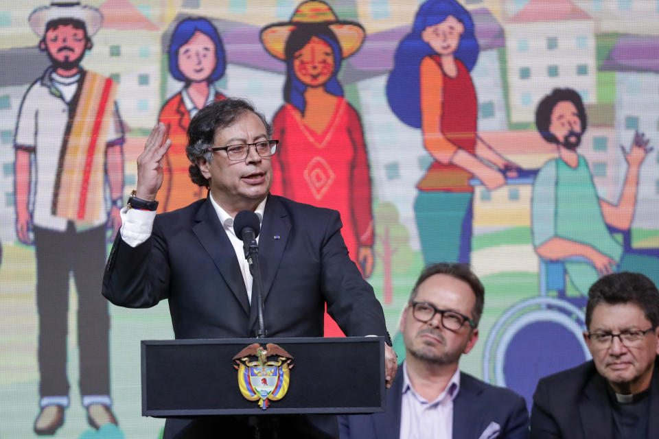 FILE - Colombian President Gustavo Petro holds a ceremony to formally begin a six-month cease-fire as part of a process to forge permanent peace with the National Liberation Army (ELN) in Bogota, Colombia, Aug. 3, 2023. Upon his historic election last year, the rebel-turned-president promised to cement “total peace” and end one of the world’s longest-running conflicts. (AP Photo/Ivan Valencia)