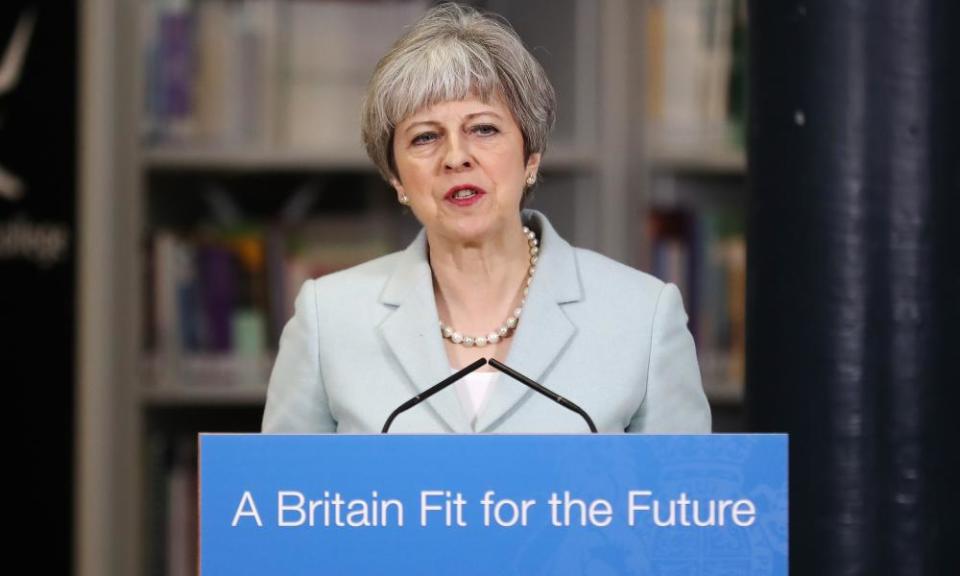 Theresa May delivers a speech to students and staff during her visit to Derby College on 19 February