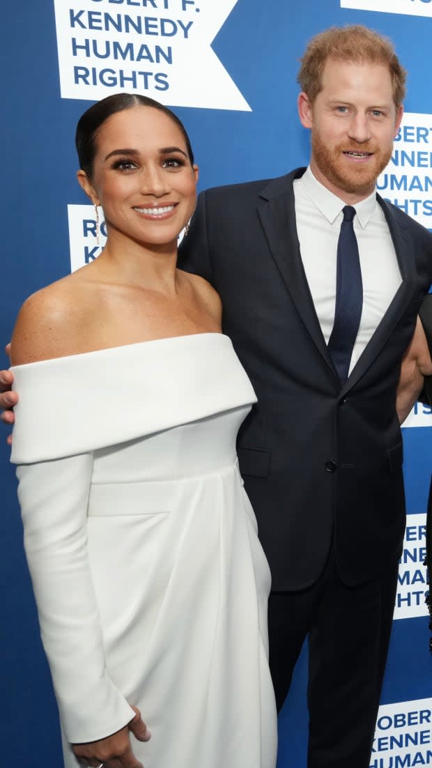 <p>Meghan Markle rocked a custom white Louis Vuitton dress and black heels to accept the Robert F. Kennedy Ripple of Hope Award in December 2022.</p><p>Kevin Mazur/Getty Images for 2022 Robert F. Kennedy Human Rights Ripple of Hope Gala</p>