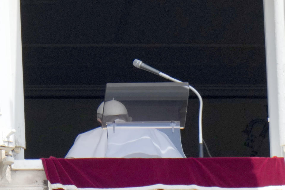 Pope Francis leaves after reciting the Angelus noon prayer from the window of his studio overlooking St.Peter's Square, at the Vatican, Sunday, July 4, 2021. In a brief announcement Sunday afternoon the Vatican said Pope Francis has gone to a Rome hospital for scheduled surgery for a stenosis, or restriction, of the large intestine. (AP Photo/Alessandra Tarantino)