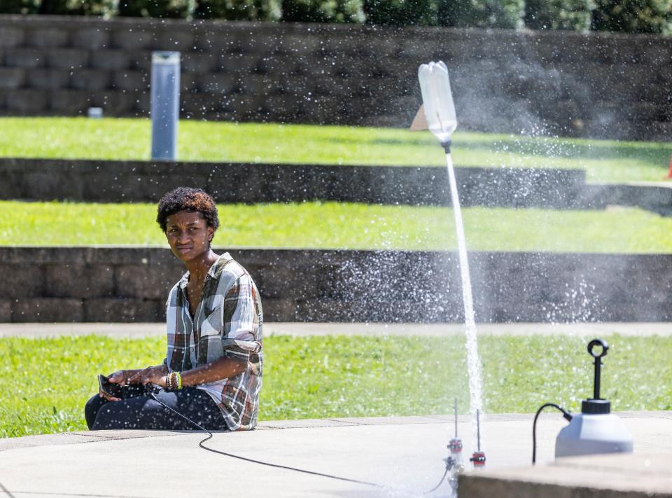 Khris'mah Campisi watches her rocket take off Monday during a STEM camp at Florida State University Panama City.