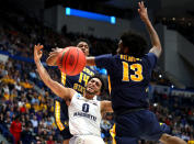 <p>Markus Howard #0 of the Marquette Golden Eagles is fouled while playing the Murray State Racers during the first round game of the 2019 NCAA Men’s Basketball Tournament at XL Center on March 21, 2019 in Hartford, Connecticut. (Photo by Maddie Meyer/Getty Images) </p>