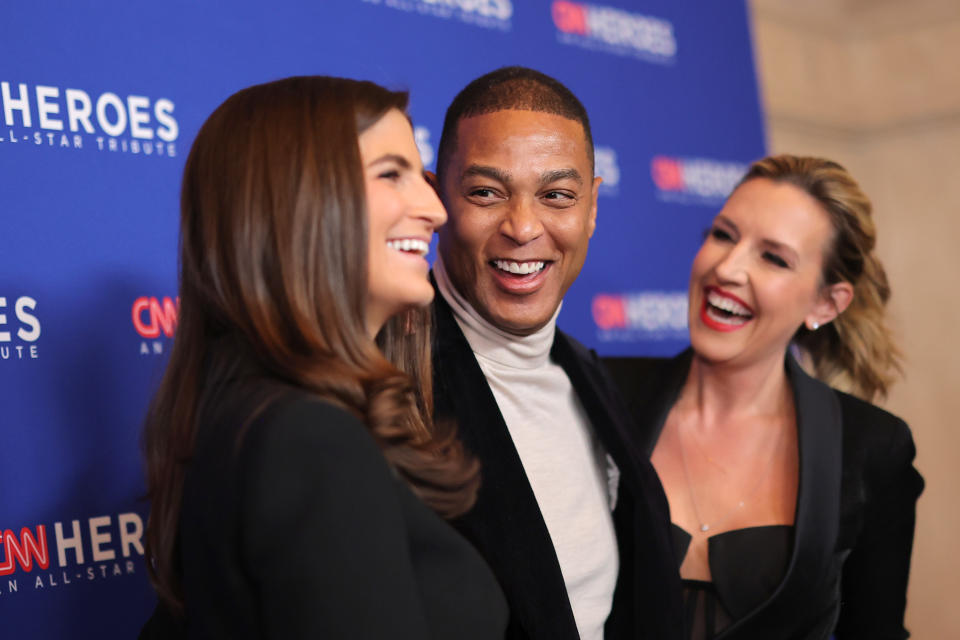 Don Lemon posing with Kaitlan Collins and Poppy Harlow.