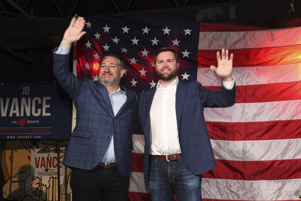 Sen. Ted Cruz, R-Texas, left, greets JD Vance, Republican candidate for U.S. Senator for Ohio, at a campaign rally in Medina, Ohio, Friday, Oct. 21, 2022. (AP Photo/Phil Long)