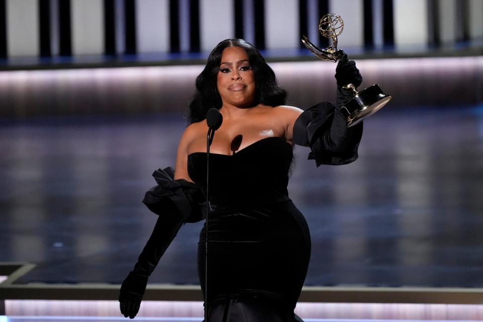 Niecy Nash-Betts accepts the award for outstanding supporting actress in a limited or anthology series or movie during the 75th Emmy Awards at the Peacock Theater in Los Angeles on Monday, Jan. 15, 2024.