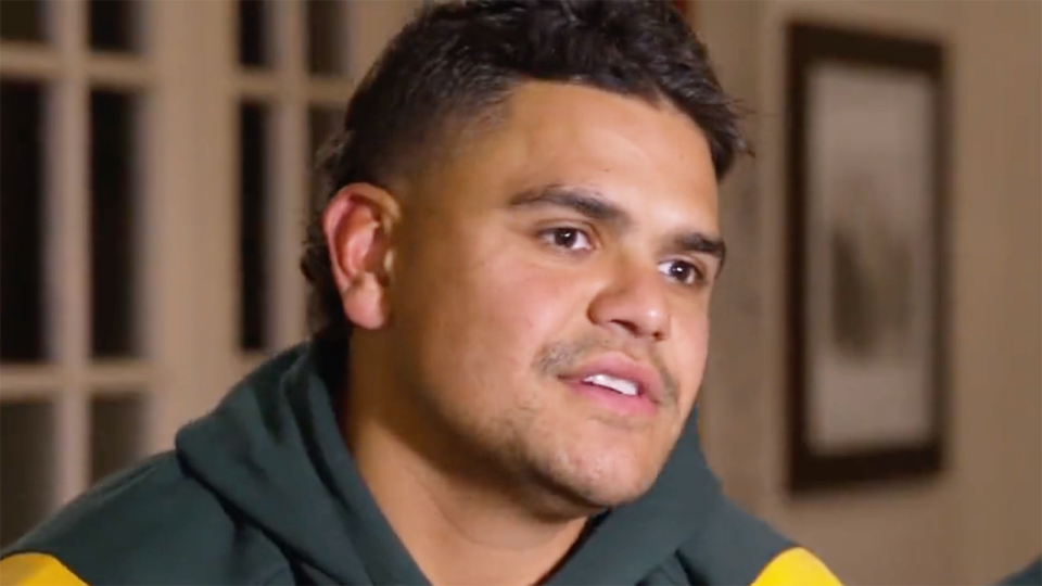 Latrell Mitchell is pictured during a news interview.