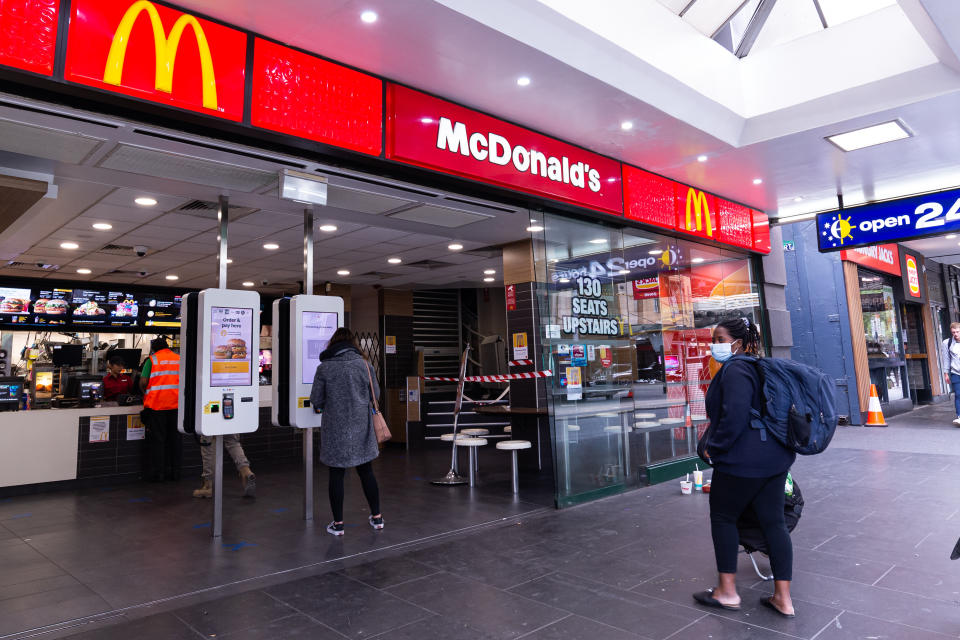 A popular McDonalds location across Flinders Street Station is seen empty during peak hour as the coronavirus continues to rapidly spread in  Melbourne, Australia on March 23, 2020. From midday on March 23, 2020, venues such as bars, nightclubs, cinemas, restaurants and gyms and any other non-essentials are to close down until further notice from the government to help combat the spread of the virus. Australia currently has 2,136 cases of COVID-19. The death toll for Australia now stands at 8. (Photo by Mikko Robles/NurPhoto via Getty Images)