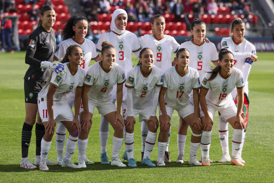 Morocco pose for a team photo ahead of the Women's World Cup Group H soccer match between South Korea and Morocco in Adelaide, Australia, Sunday, July 30, 2023. (AP Photo/James Elsby)