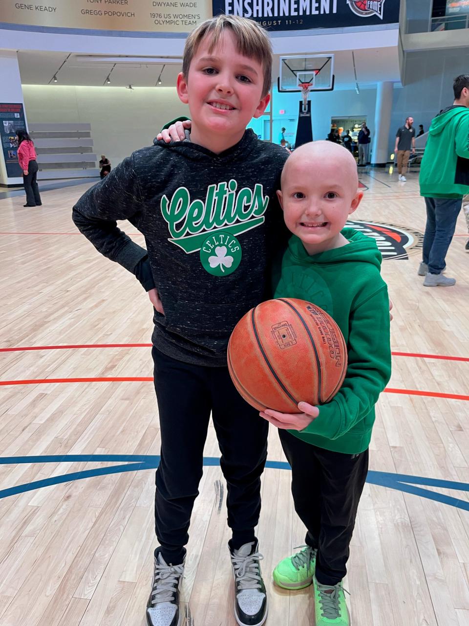 Liam and Sam Chapman both love to play basketball. Here they are at the International Basketball Hall of Fame in Springfield.