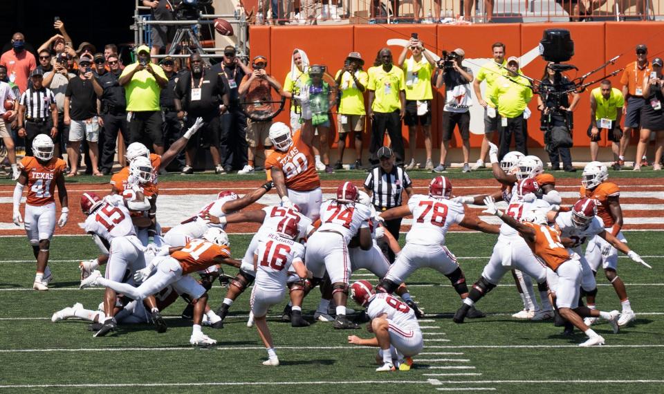 Alabama kicker Will Reichard boots his game-winning 33-yard field goal in the closing seconds of last year's Texas-Alabama game in Austin, a 20-19 Crimson Tide victory. The two teams tangle again Saturday night in Tuscaloosa.