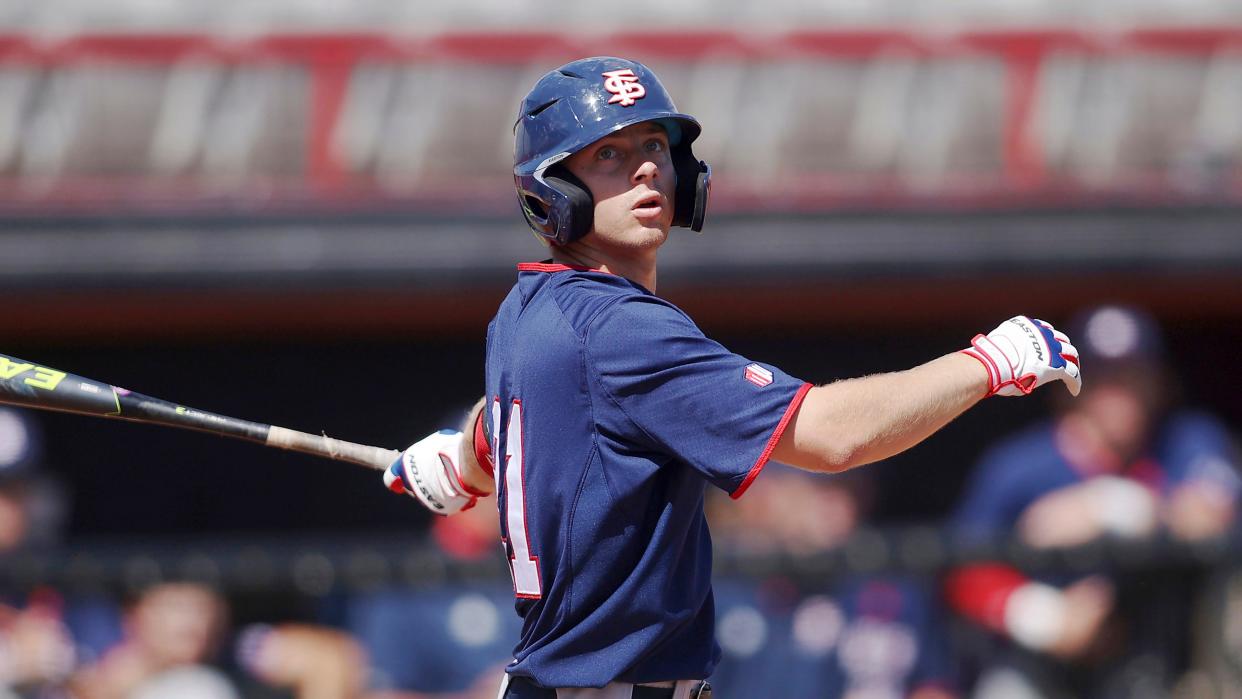 Fresno State catcher Zach Morgan (21) watches a foul ball during an NCAA baseball game against UNLV on Friday, April 2, 2021, in Las Vegas.