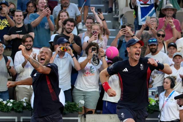 Andy Murray and Dan Evans celebrate in their first round match at the Olympics (Andy Wong, PA)