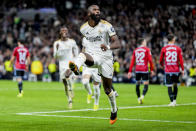 Real Madrid's Antonio Rudiger celebrates after scoring his side's second goal the Spanish La Liga soccer match between Real Madrid and Celta Vigo at the Santiago Bernabeu stadium in Madrid, Spain, Sunday, March 10, 2024. (AP Photo/Manu Fernandez)