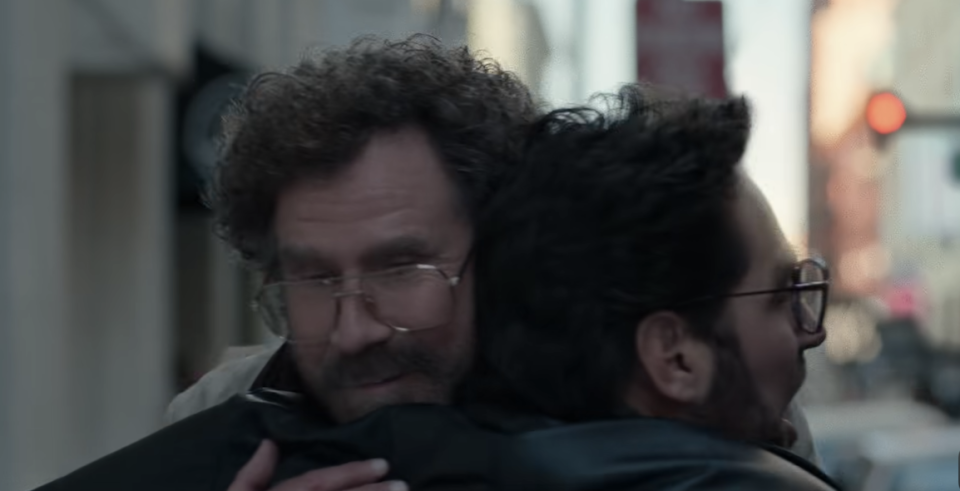 Marty and Ike hug on the street