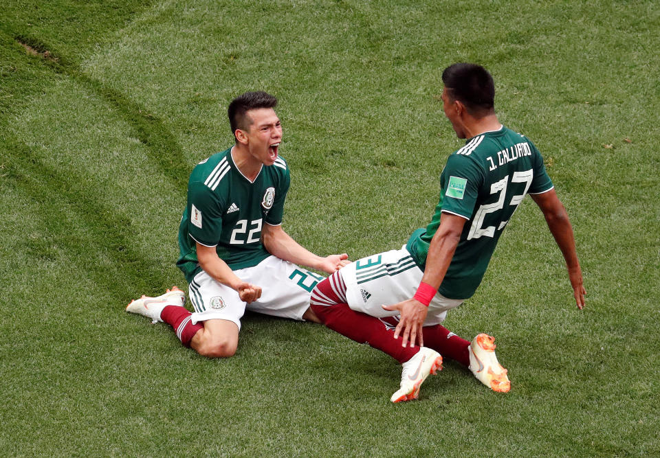 Mexico's Hirving Lozano celebrates scoring their first goal with Jesus Gallardo.