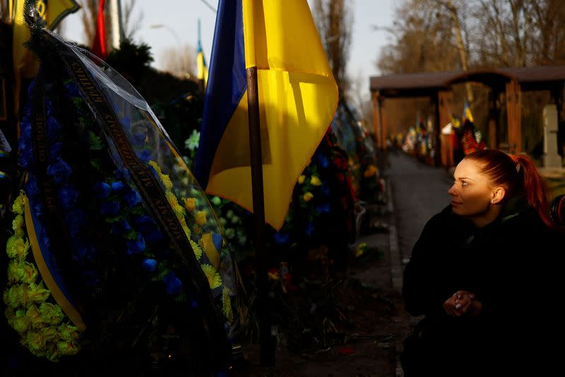 FILE PHOTO: Ukrainian actor Birzul visits grave af her younger brother Krotov in Kyiv