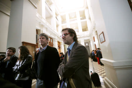 FILE PHOTO: James Hamilton and Juan Andres Murillo, victims of clerical sexual abuse in Chile, attend a court seeking compensation in civil case in Santiago, Chile, October 18, 2018. REUTERS/Ivan Alvarado/File Photo