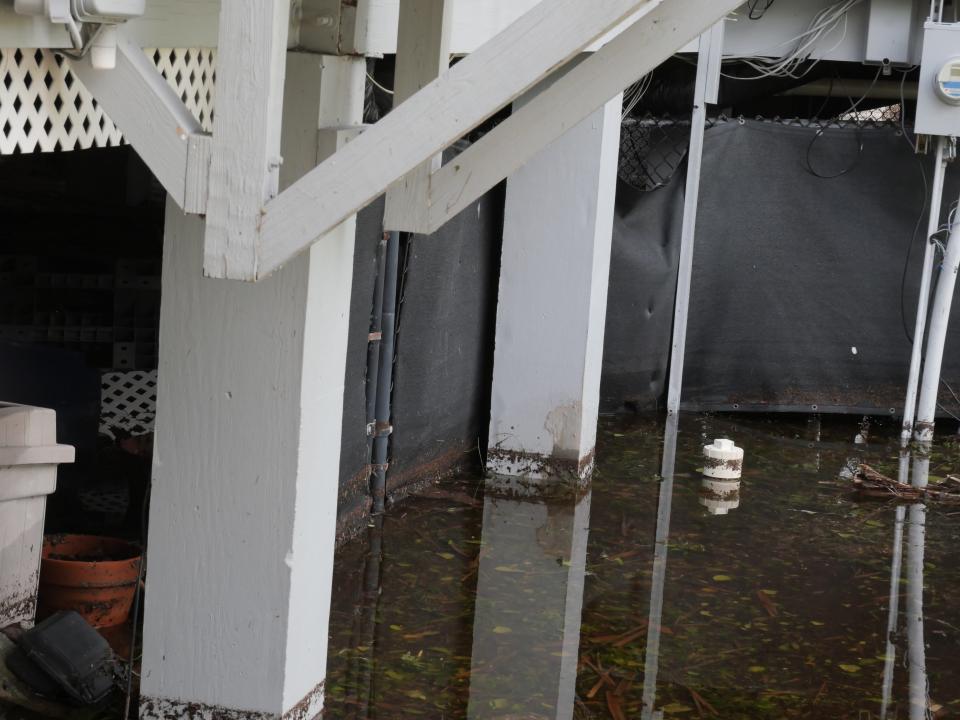 Water rose up under the historic Hermitage House at the Hermitage Artist Retreat, which may have suffered more than $1 million in damage on Manasota Key during Hurricane Ian.