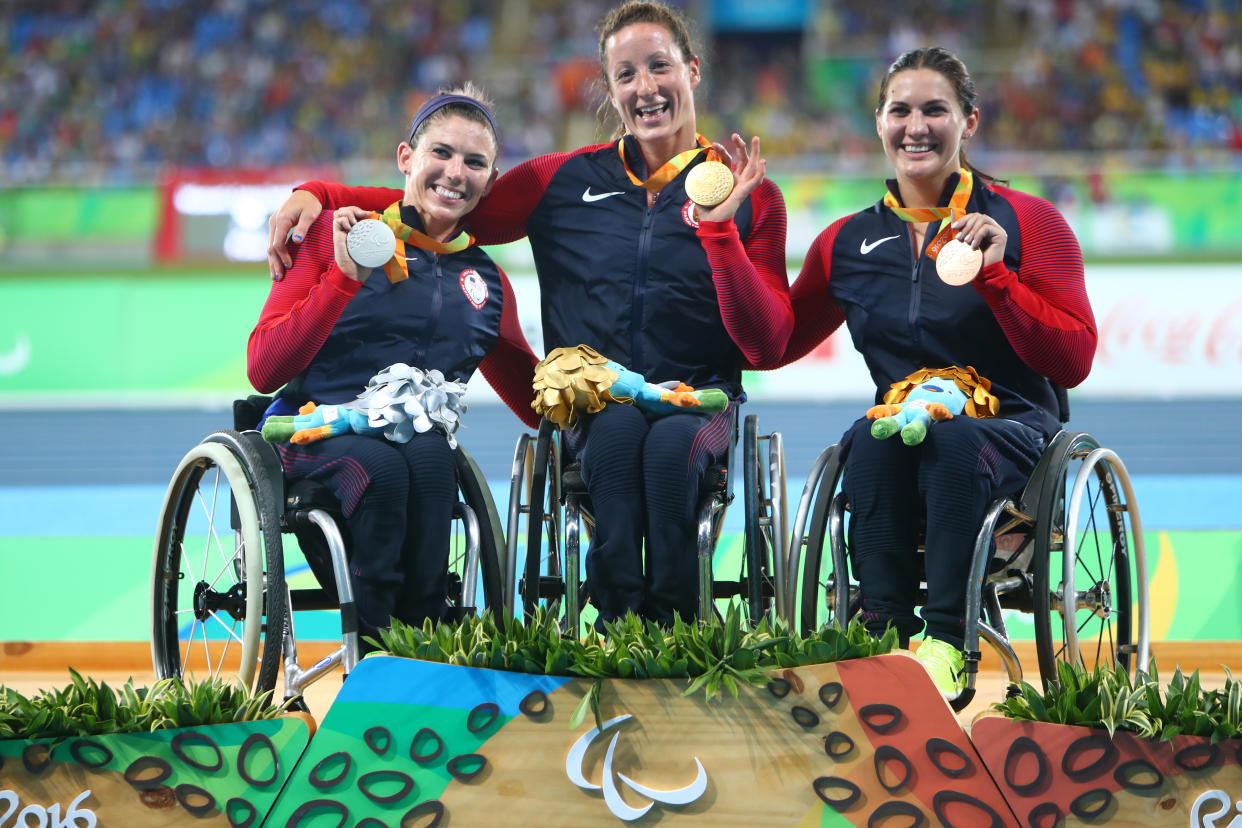 RIO DE JANEIRO, BRAZIL - SEPTEMBER 13:  (L-R) Silver medalist Amanda McGrory of United States, gold medalist Tatyana McFadden of United States and bronze medalist Chelsea McClammer of United States pose on the podium at the medal ceremony for men's Club Throw - F32 during day 6 of the Rio 2016 Paralympic Games at the Olympic Stadium on September 13, 2016 in Rio de Janeiro, Brazil. (Photo by Lucas Uebel/Getty Images)