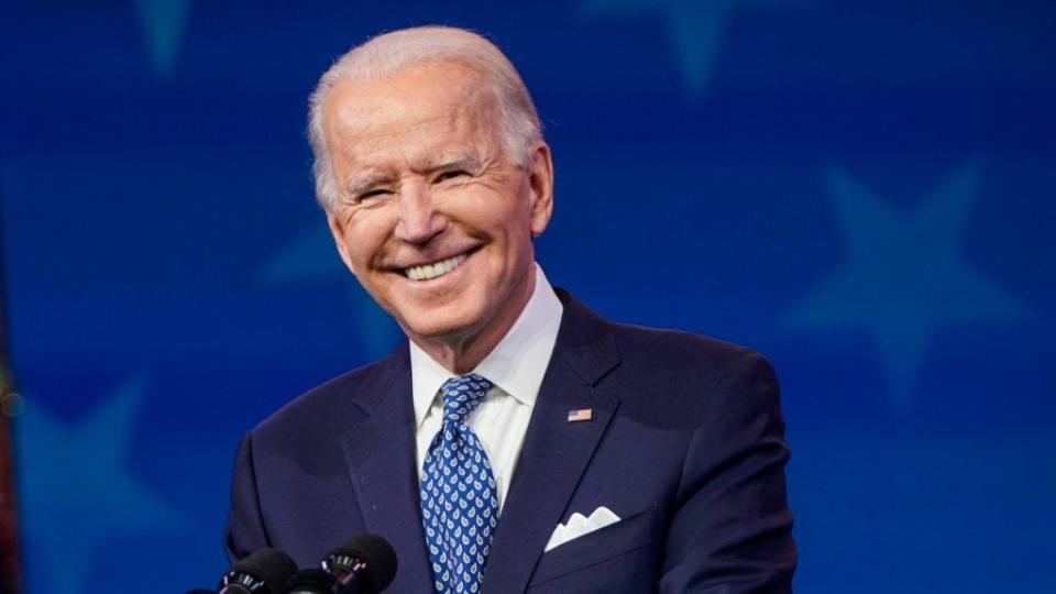 President-elect Joe Biden speaks Tuesday ahead of the Christmas holiday at the Queen Theatre in Wilmington, Delaware. (Photo by Joshua Roberts/Getty Images)