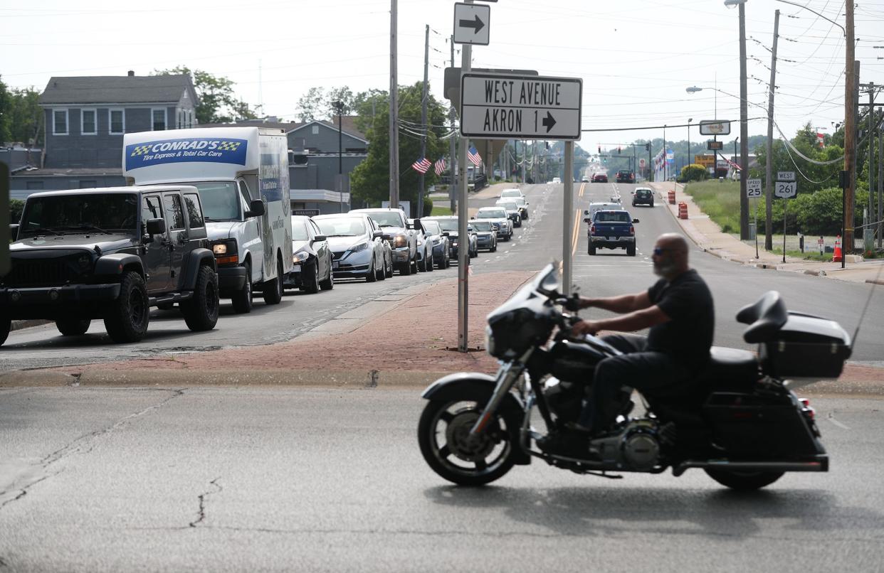 Traffic entering the Tallmadge Circle from the west is backed up on West Avenue past Wright Road.