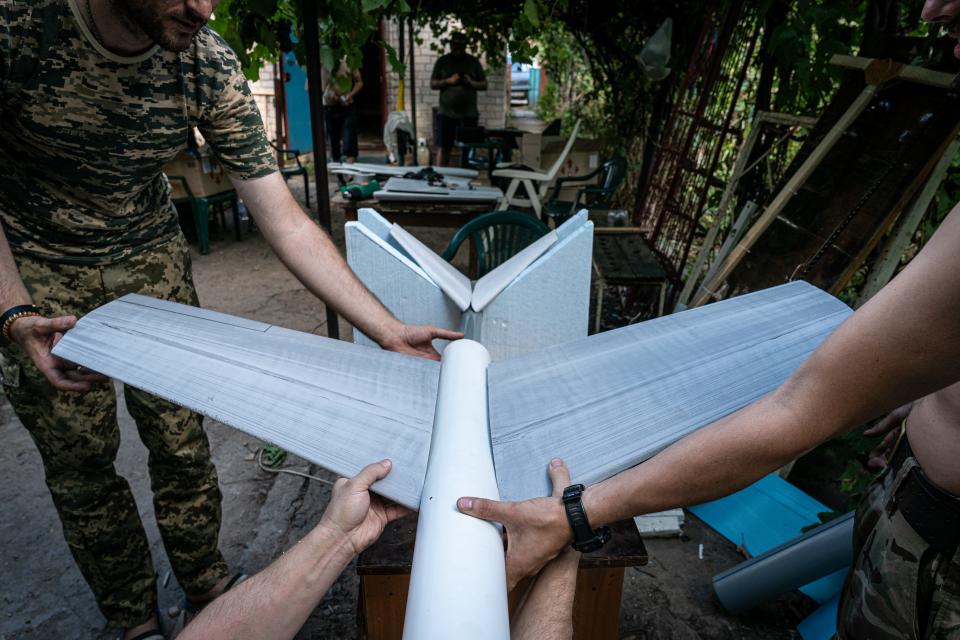 Ukrainian soldiers build home-made drones, as the Russia-Ukraine war continues in Donetsk Oblast, Ukraine on August 16, 2023