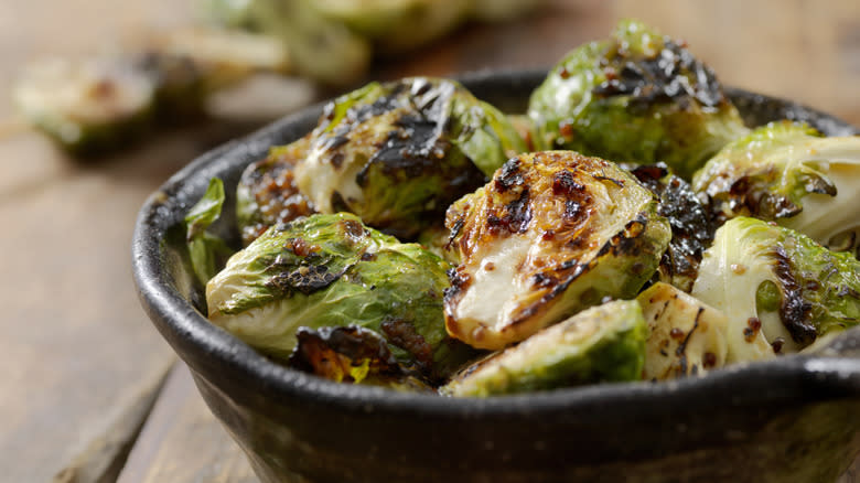 Roasted Brussel sprouts in a black bowl