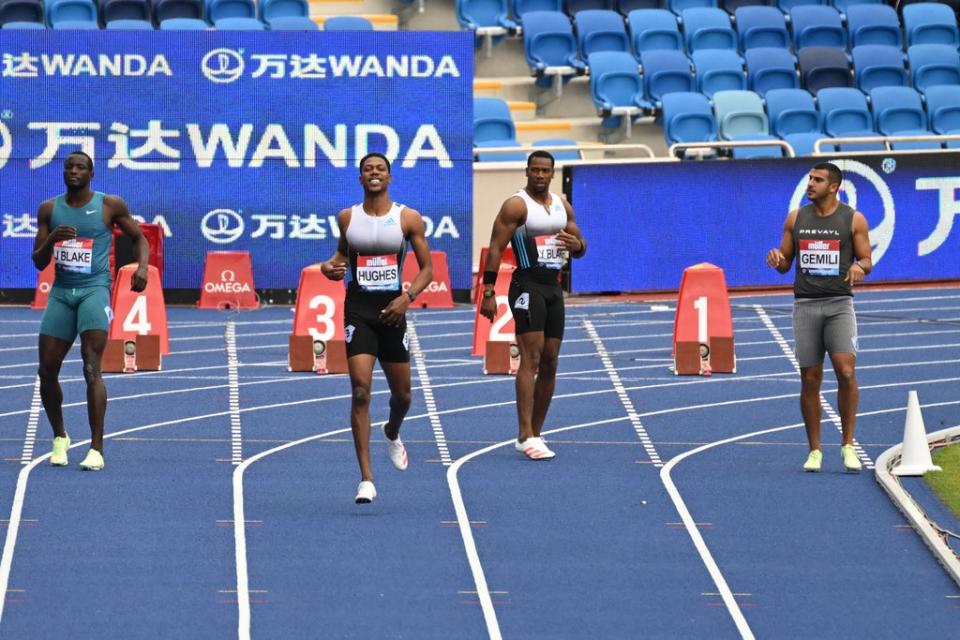 Zharnel Hughes is disqualified after a false start in the Men’s 100m (AFP via Getty Images)