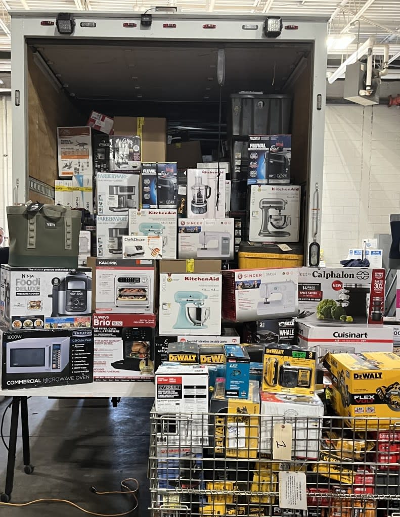 A backroom of the illegal pawnshop in Brentwood, NY, busted by the Suffolk County DA was stuffed with stolen goods, including kitchen goods, luxury items and even professional building supplies, that were destined to be sold online.