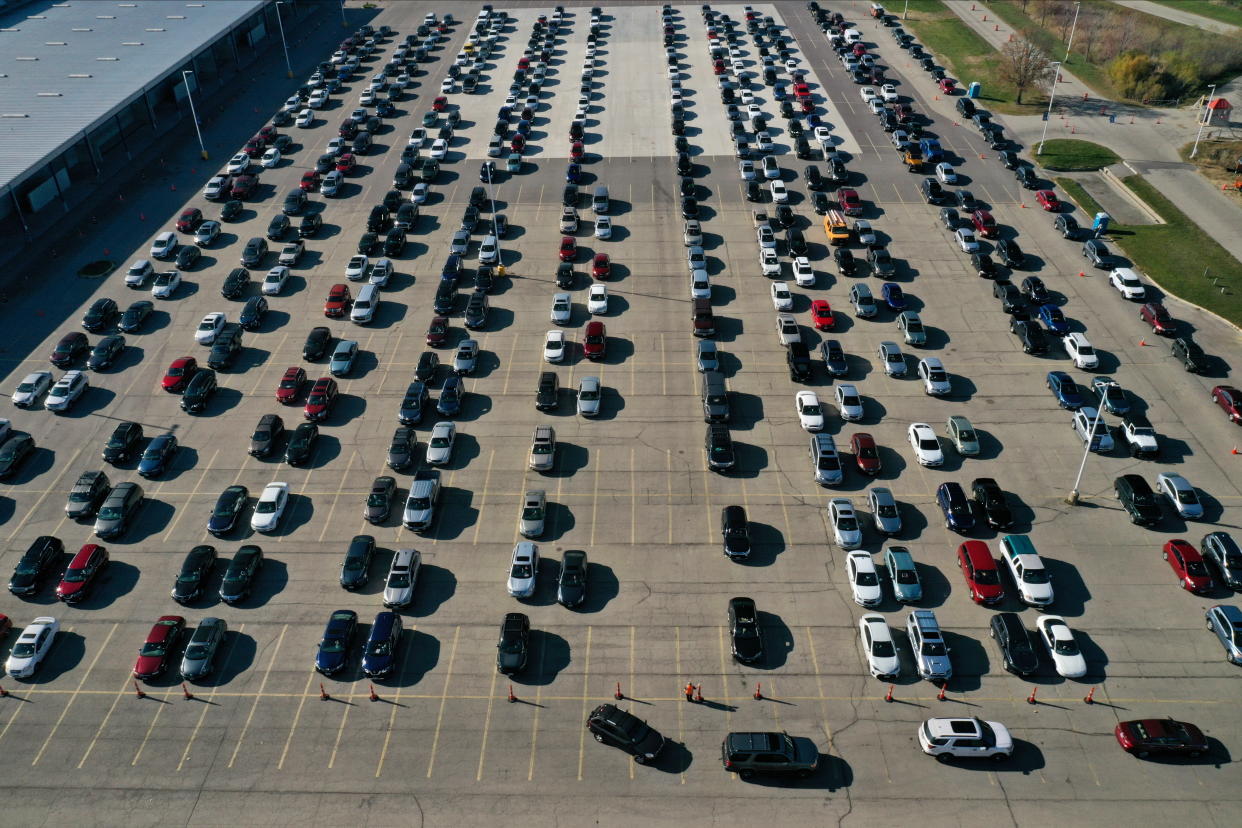 An aerial view of vehicles queuing at a drive-thru COVID-19 testing site at the Alliant Energy Center complex, as the coronavirus disease outbreak continues in Madison, Dane County, Wisconsin, U.S., November 5, 2020. (Bing Guan/Reuters)