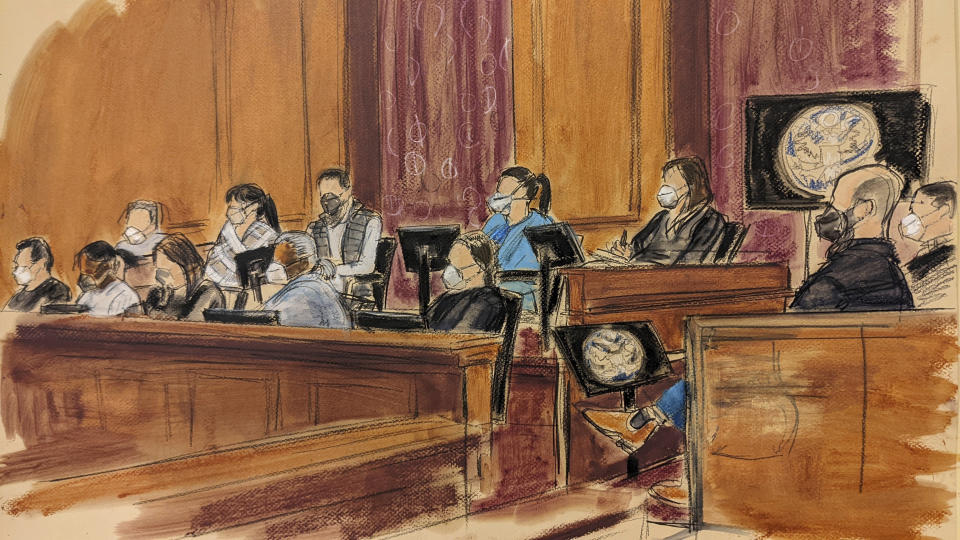 This courtroom sketch shows 12 jurors seated with face masks in the Stormy Daniels' lawsuit trial against Michael Avenatti in federal court, Friday Jan. 28, 2022, in New York. (Elizabeth Williams via AP)